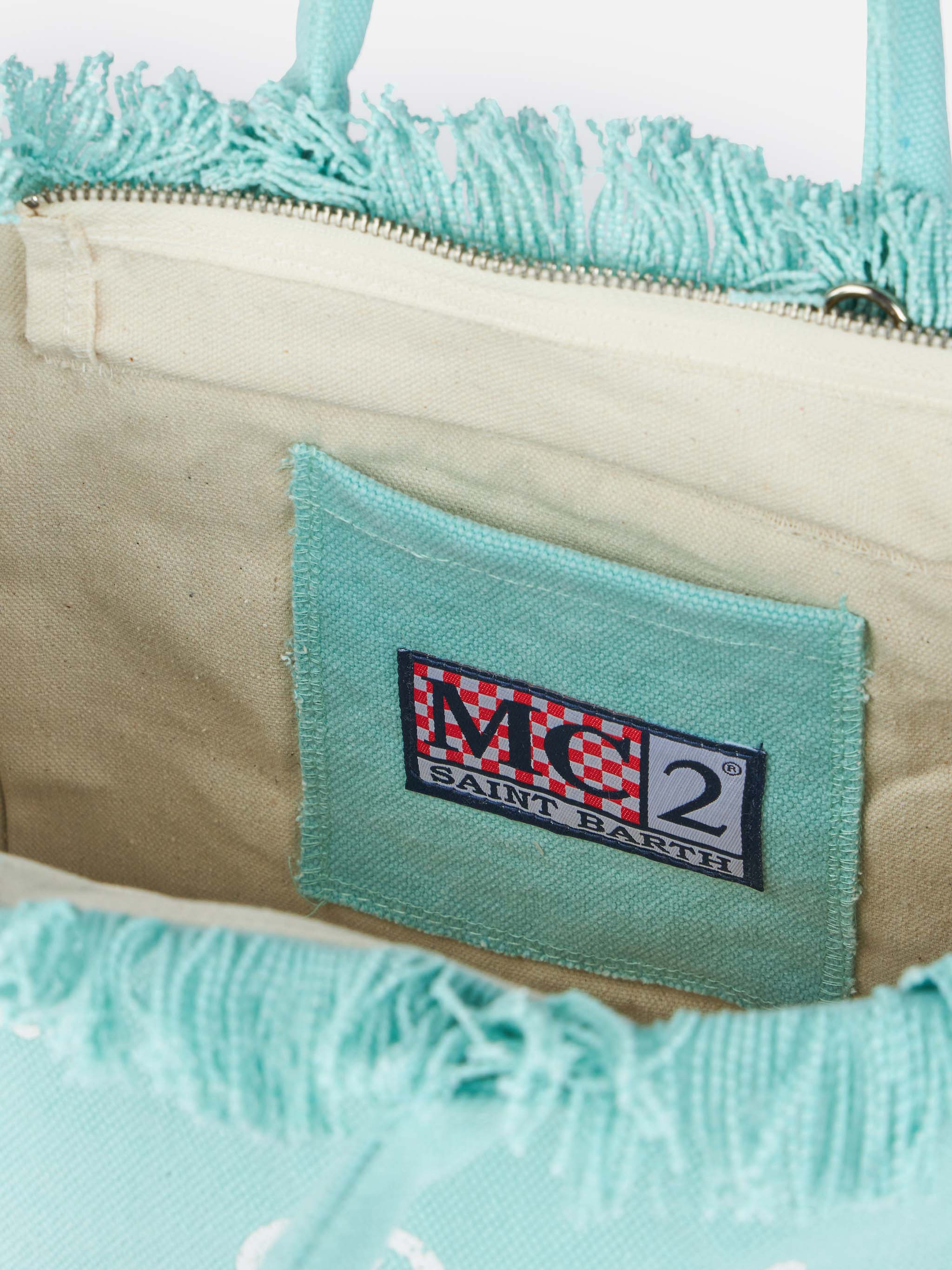 Colette water green cotton canvas handbag