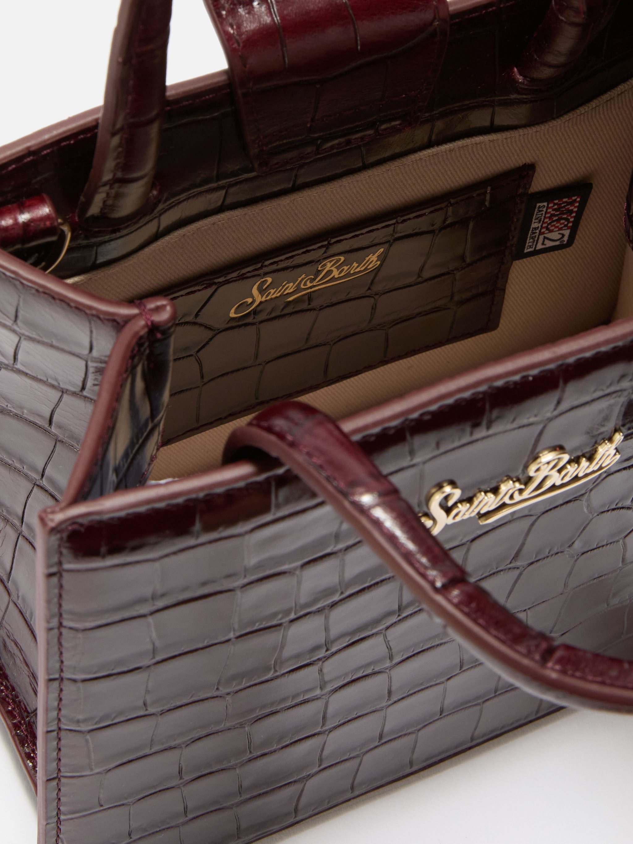 Shop Bag Mini Handbag in burgundy crocodile-print leather